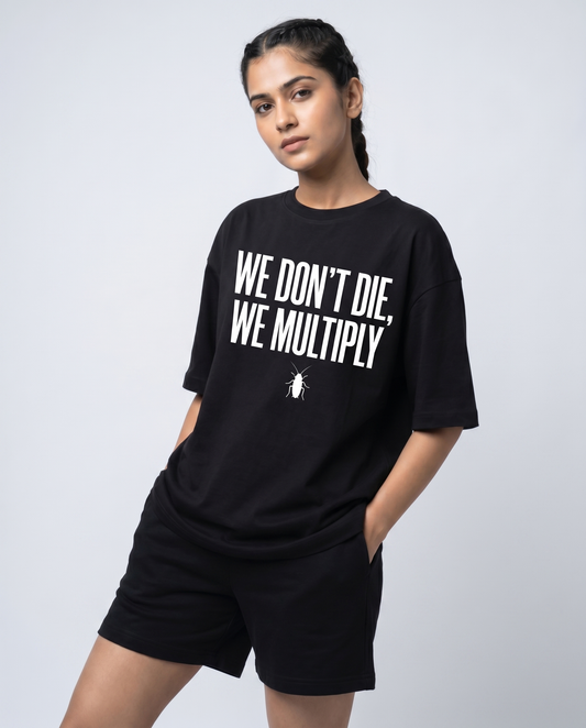 WE DON'T DIE WE MULTIPLY — Oversized Black Tee | Cockroach Janta Party