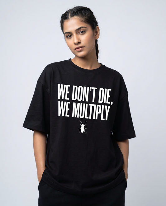 WE DON'T DIE WE MULTIPLY — Oversized Black Tee | Cockroach Janta Party