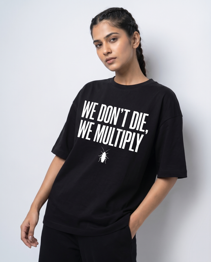 WE DON'T DIE WE MULTIPLY — Oversized Black Tee | Cockroach Janta Party